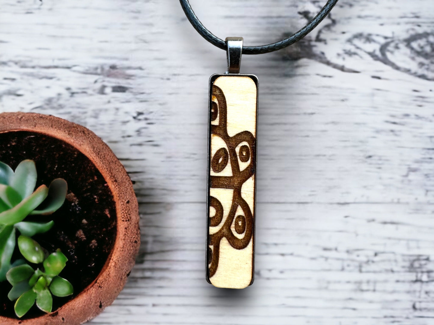 Taino Coqui Sol Pendant Necklace: engraved wood Puerto Rico Art Jewelry